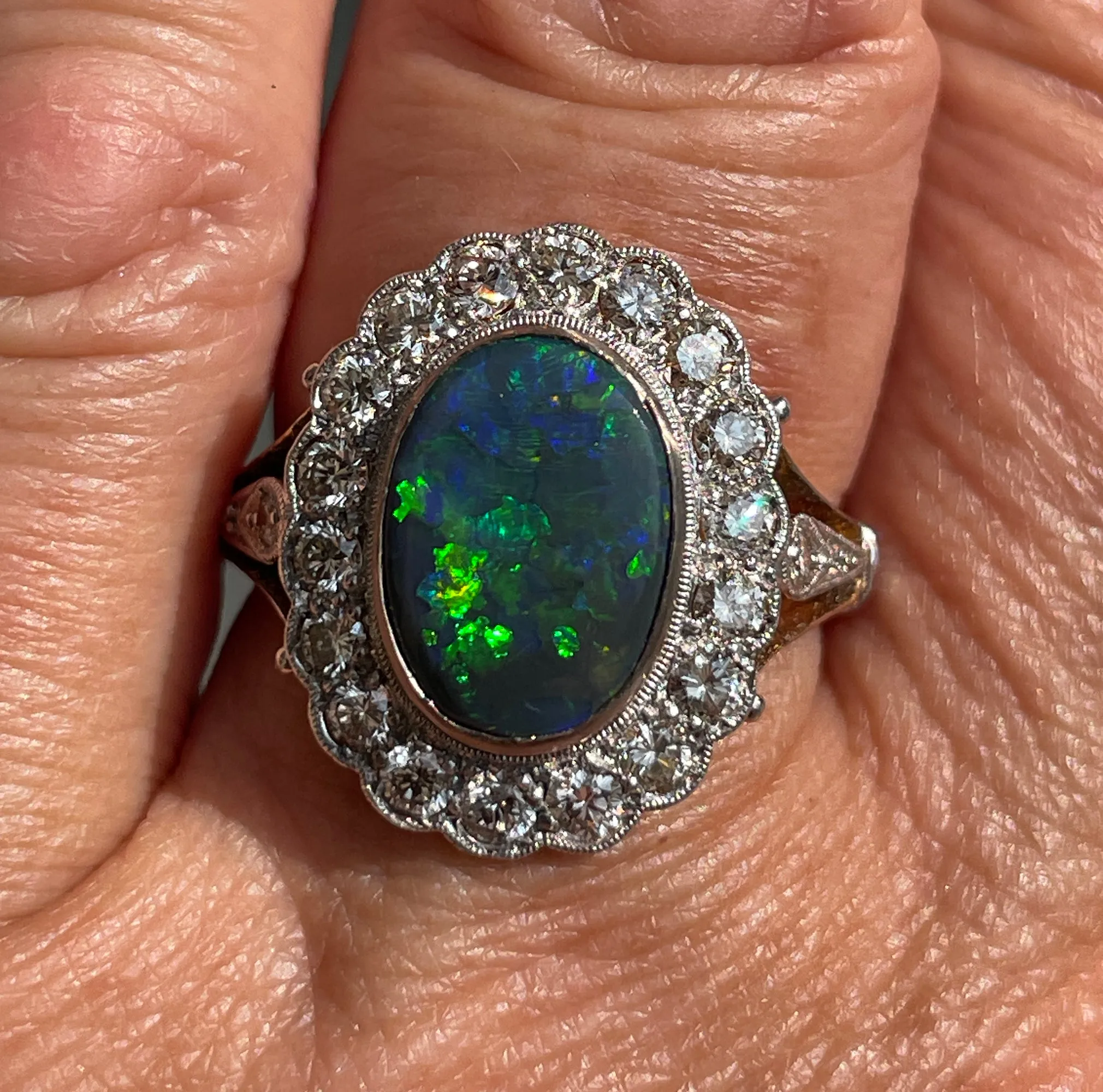 An exquisite 2.25ct Authentic Antique Art Deco Black Opal and Diamond Cluster Cocktail 18K Gold Ring