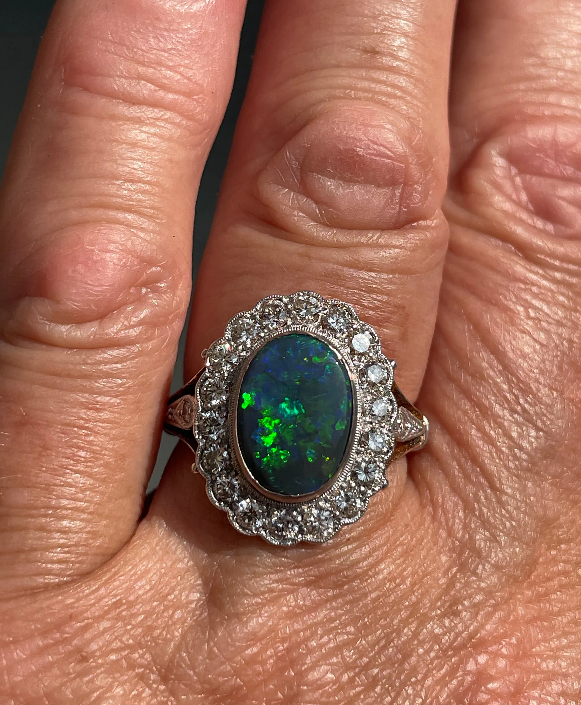 An exquisite 2.25ct Authentic Antique Art Deco Black Opal and Diamond Cluster Cocktail 18K Gold Ring