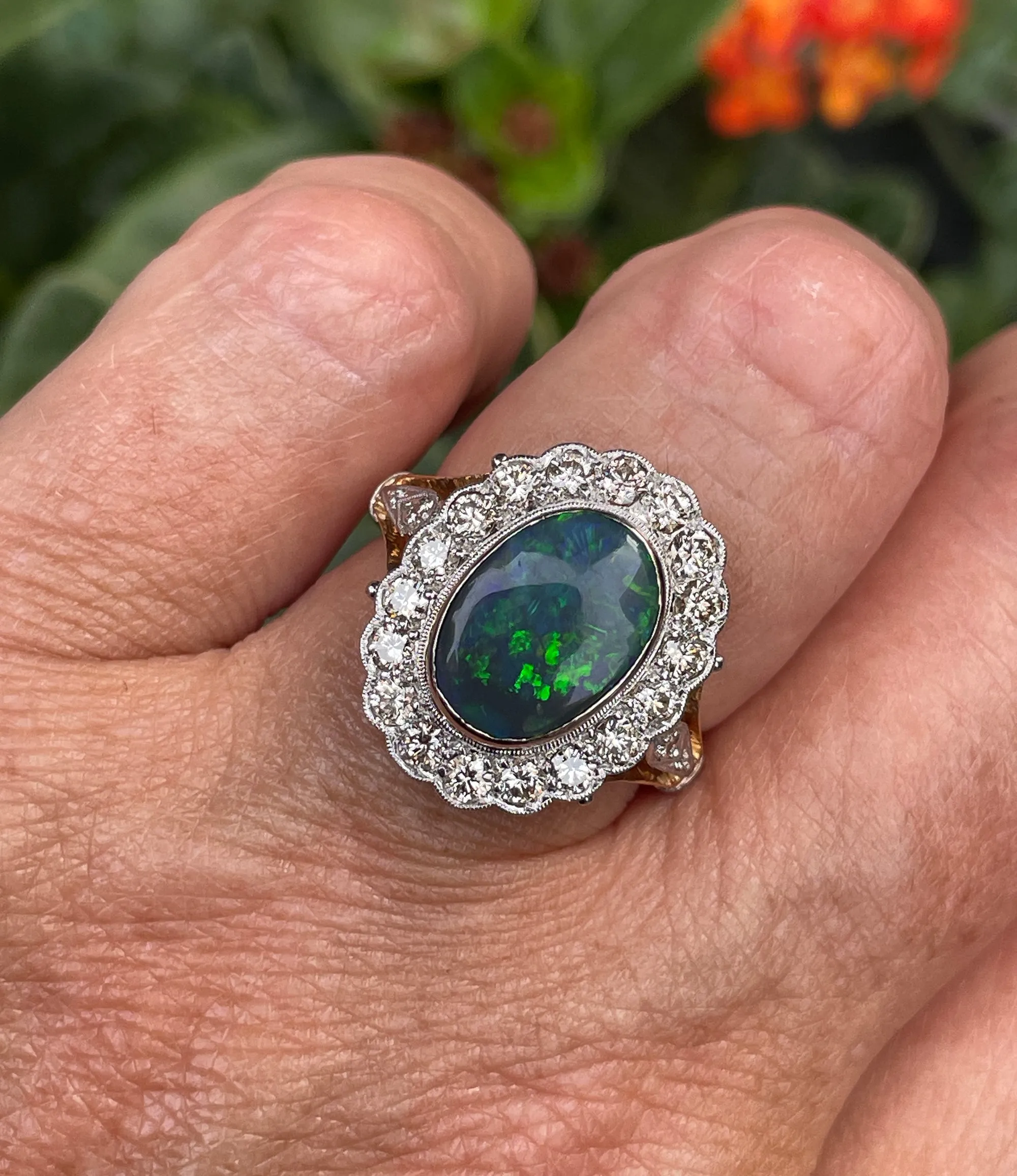 An exquisite 2.25ct Authentic Antique Art Deco Black Opal and Diamond Cluster Cocktail 18K Gold Ring