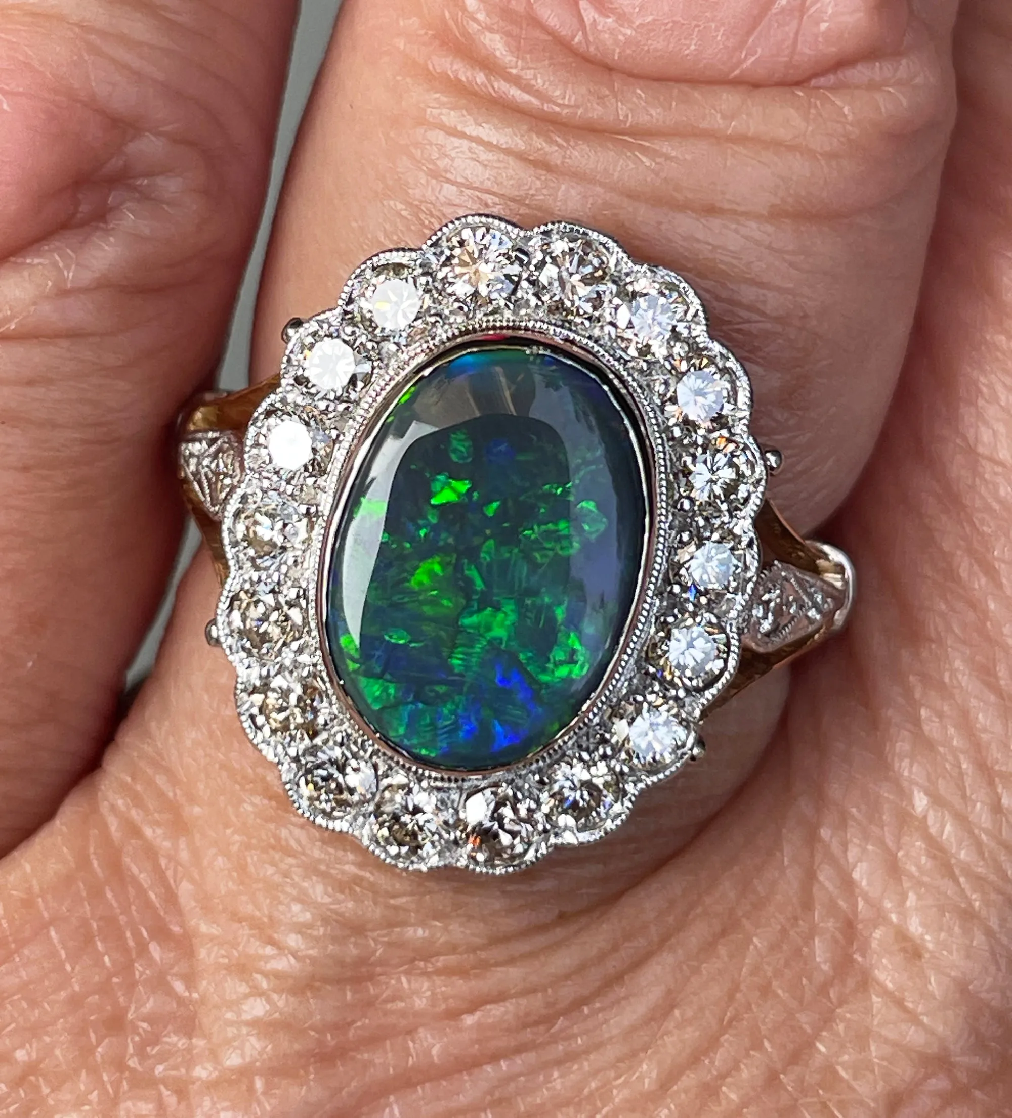 An exquisite 2.25ct Authentic Antique Art Deco Black Opal and Diamond Cluster Cocktail 18K Gold Ring