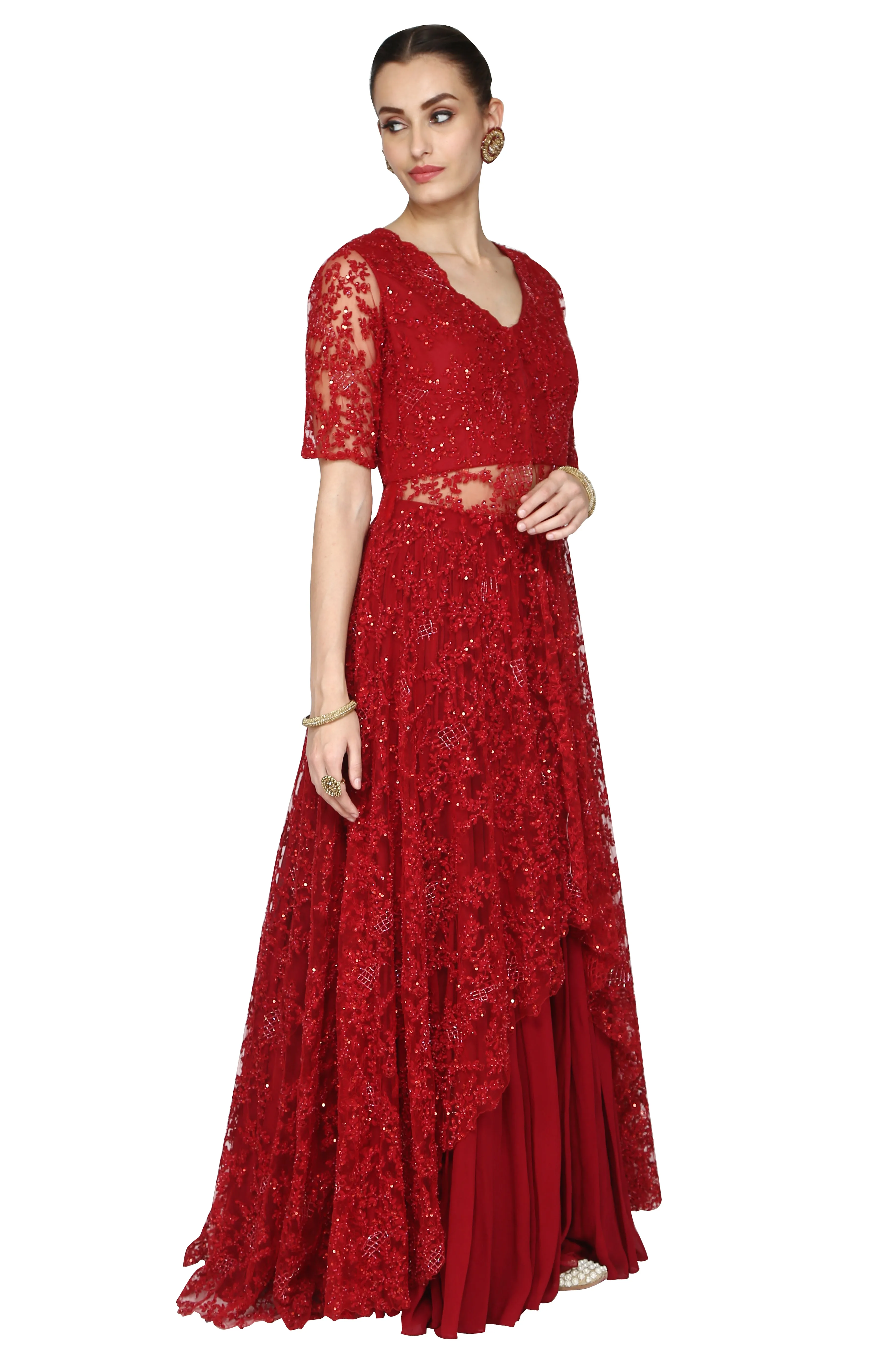 Deep red tunic and long skirt.