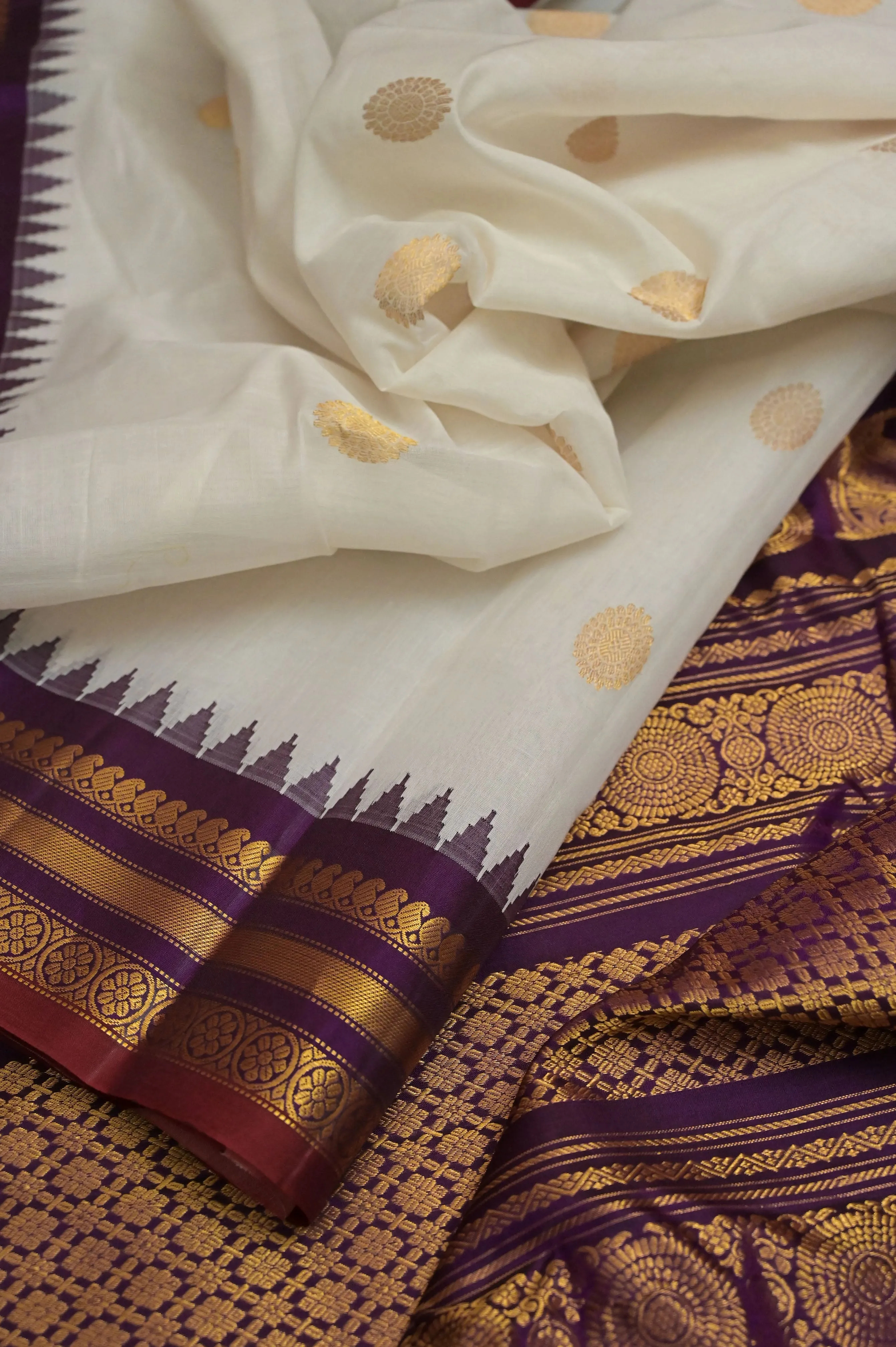 Dirt White and Purple Color Cotton Gadwal Saree with Golden Butta and temple Border