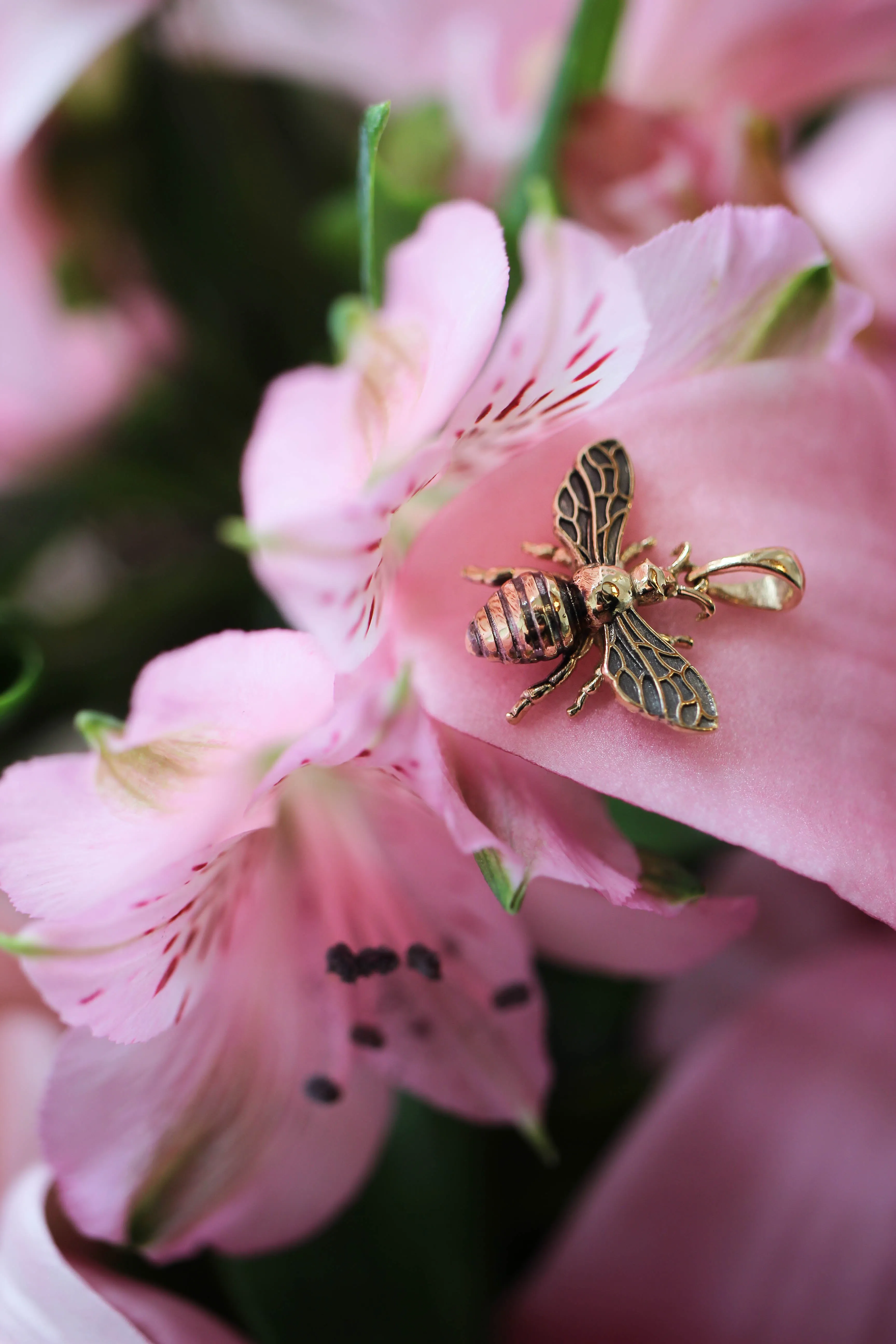 Gold bee pendant